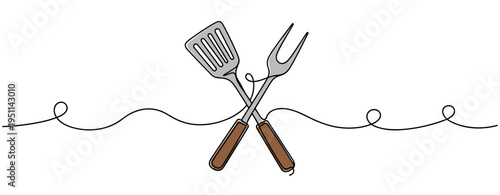 Grill spatula and carving fork crossed over white background. no editable strokes