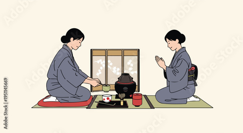 Two women in traditional attire participate in a Japanese tea ceremony