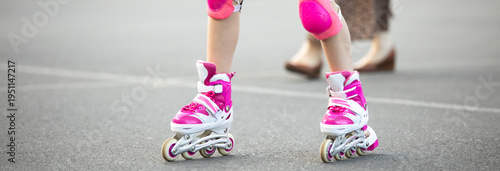 Little Girl Roller Skating Outdoors