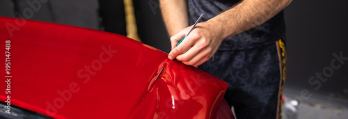 Process of Red Car Vinyl Wrapping