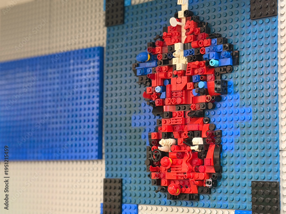 Fototapeta premium Red and blue lego mosaic on baseplate