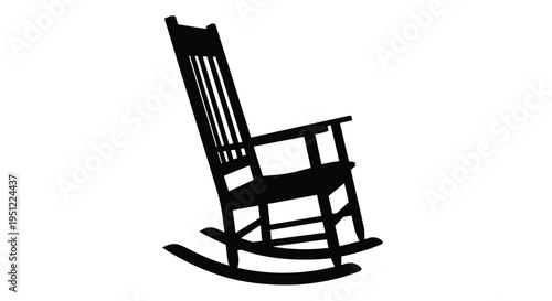 A black rocking chair stands alone a striking silhouette