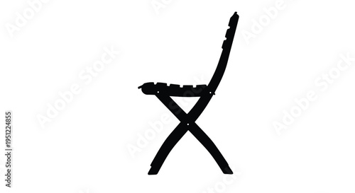 A stark black chair stands alone presenting a striking silhouette