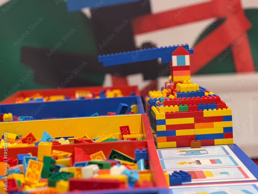 Naklejka premium Colorful lego bricks and built structure