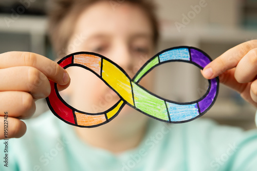 Принти на полотні Autism infinity rainbow symbol sign in kid hand