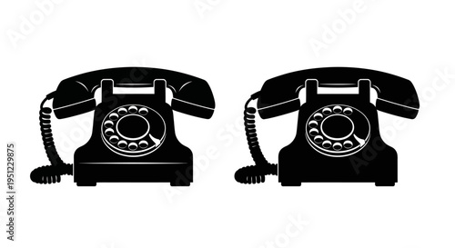 Two black silhouette illustrations of classic rotary dial telephones
