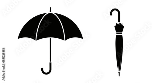 Two black umbrella icons displayed in different orientations