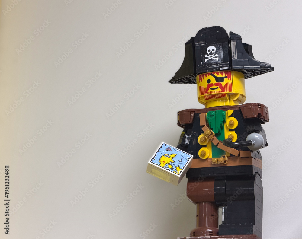 Fototapeta premium Lego pirate minifigure with treasure map