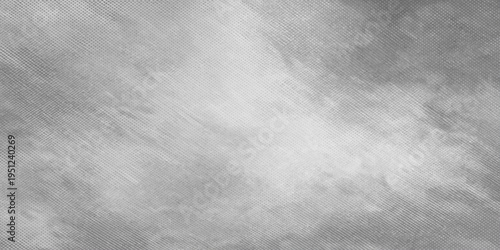 A dark brushed metal background with a grunge gray texture and aged black pattern creates a vintage dirty surface for an old industrial wall wallpaper