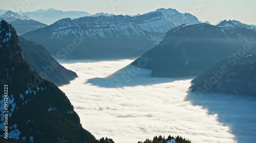 a sea of clouds in the mountains