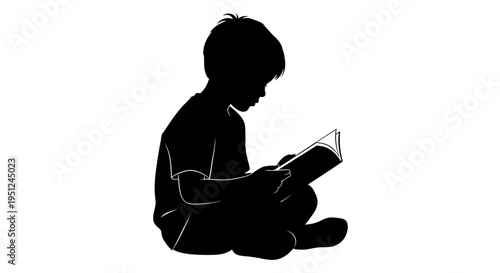 Silhouette of a boy reading book.