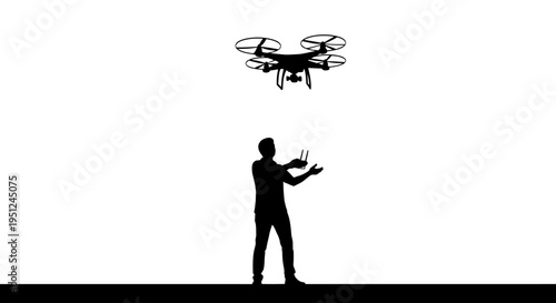 Man operating a flying drone.