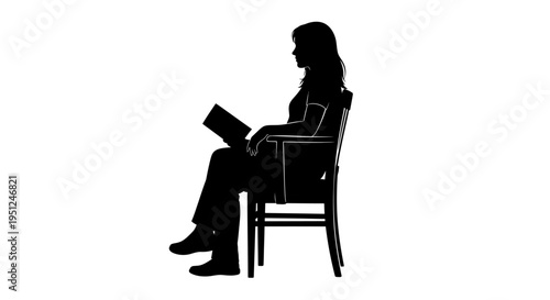 Woman Sitting in Chair Reading Book.
