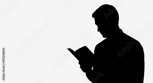 Man Reading a Book Silhouette Portrait.