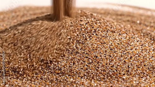 Close-Up of Sand Pouring Down in Slow Motion, Forming a Pile