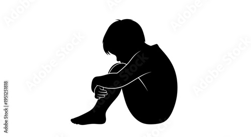 Sad child sitting alone depressed.