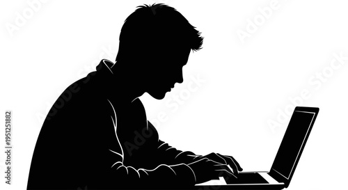 Man working on laptop computer.