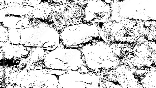 Black and white stone wall texture background with rugged stones
