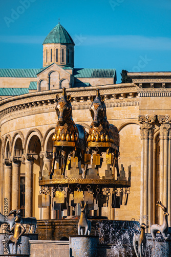 the Colchis Fountain. symbol of the city of Kutaisi , Georgia, with the Bagrati cathedral in the background