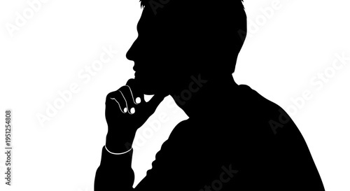 Man thinking with hand on chin.