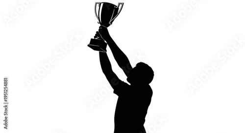 Man holding up a trophy cup.