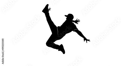 Silhouette of a dancing person jumping.