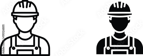 Two construction workers in hard hats and overalls