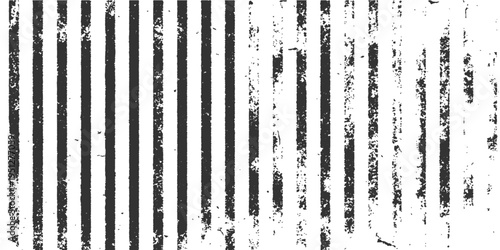 A black and white abstract artwork. The photo depicts a pattern of vertical lines. The varying thickness and density of lines create a dynamic visual effect, suggesting movement and depth. 