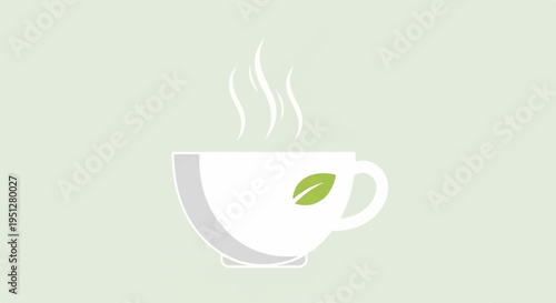 Steaming white tea cup with green leaf on light green background symbolizing relaxation and calmness