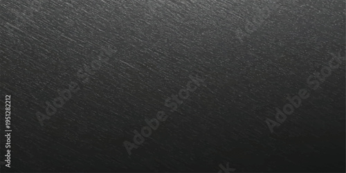 Dark metallic brushed surface with fine lines and subtle light streaks, offering a modern and industrial abstract background for various design applications