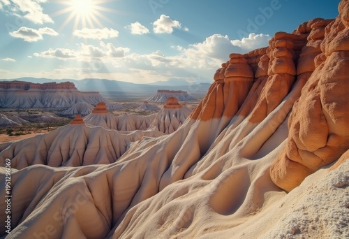 Eroded Badlands: Inspired Formations in Bold Brown Tones and Striking Shadows under Dramatic Conditions