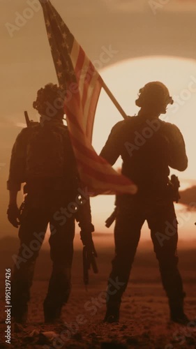 Vertical Screen: Special Forces Soldiers Stride Across a Middle East Desert at Sunset, Weapons Ready, Carrying the American Flag During a Modern Operation For Freedom and Peace. Cinematic Victory 