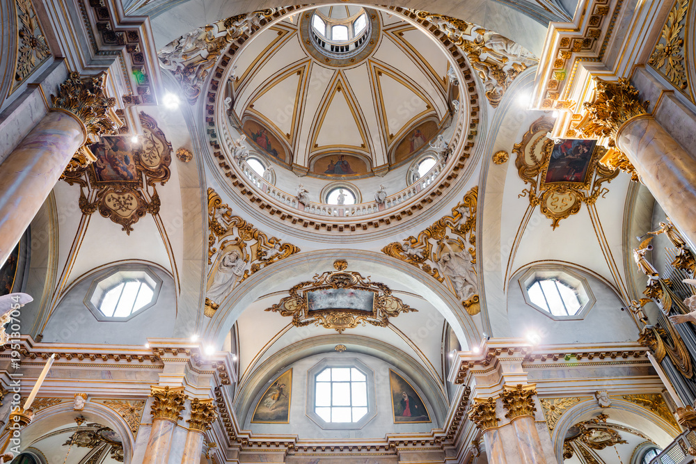 Obraz premium Wide angle interior view of the Monte Berico Sanctuary showing the monumental columns, decorated arches, and the central dome in Vicenza, Italy 08.01.2026