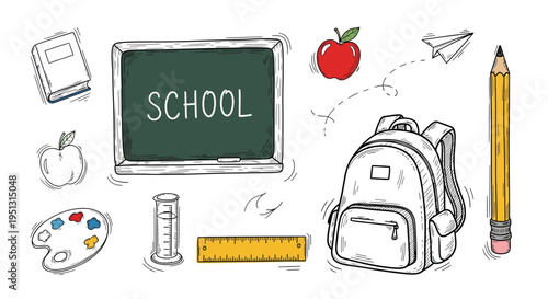 A collection of school supplies and objects on a table indoors