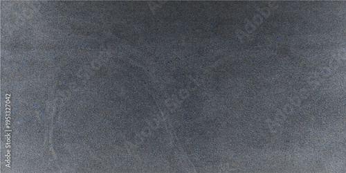 Texture of a dark, textured surface, the image reveals subtle nuances, shadows, and variations, evoking a sense of depth and intrigue. 