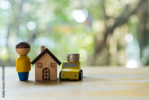People home and car with coin on car roof. Buy or sell house and car. Property investment, saving for the future and building a house