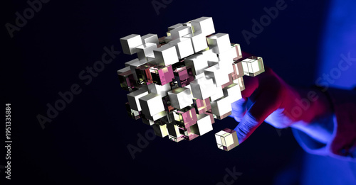 Abstract 3D cubes held by h...