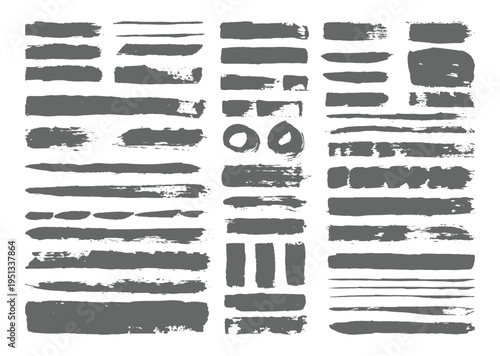 Collection of assorted gray brush strokes and textures on white background