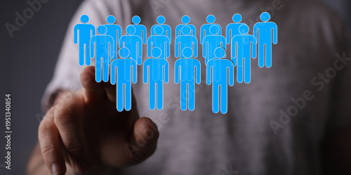 Hand touching blue figures ...