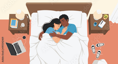 Top view of a diverse couple sleeping peacefully in bed in a cozy bedroom filled with personal items and electronics.