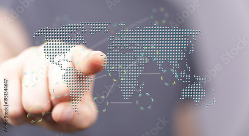 Person's hand pointing at a...