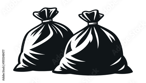 Two black plastic garbage bags filled with household refuse, showcasing concepts of waste disposal and sanitation
