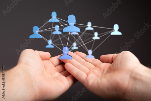 An image of hands holding a...