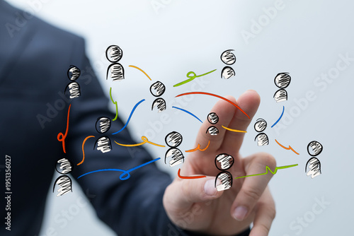 Hand pointing at a network ...