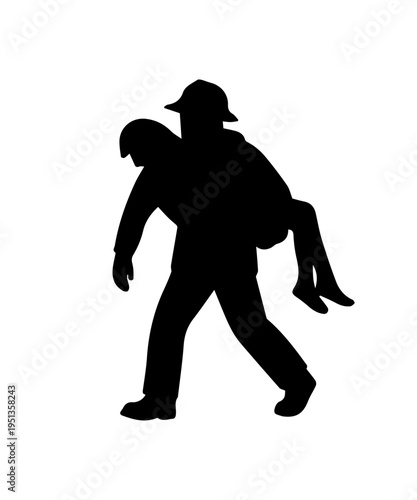 Firefighter silhouette carrying injured person during rescue operation