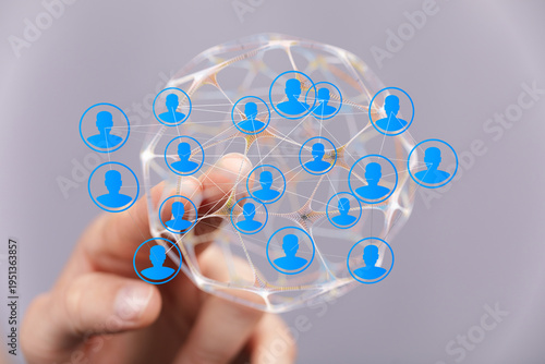 Hand holding a digital netw...