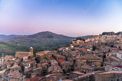 Bild auf Leinwand Sunset panorama of Mistretta village in the Nebrodi Mountains, Sicily