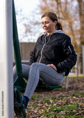 Wallpaper Mural Woman Doing Leg Exercises On The Outdoor Gym Equipment In The Park Torontodigital.ca
