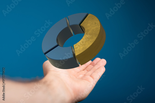 Hand holding a 3D pie chart...