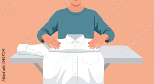 Person neatly folding a crisp white dress shirt on a table